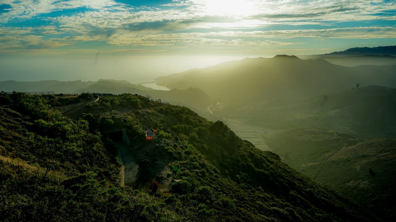 Green hills along a long hiking trail